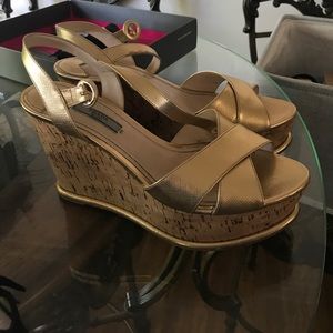 Prada gold wedges