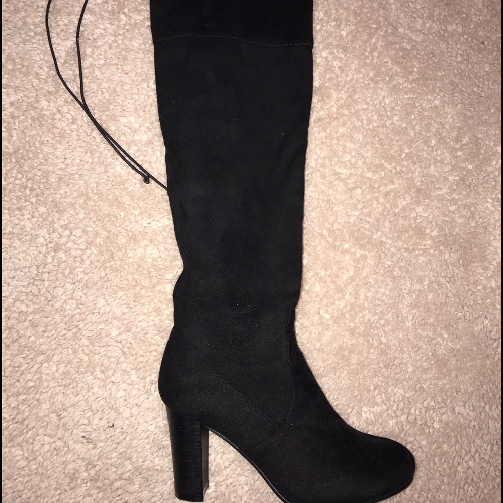 Thigh-High Heeled Boots.