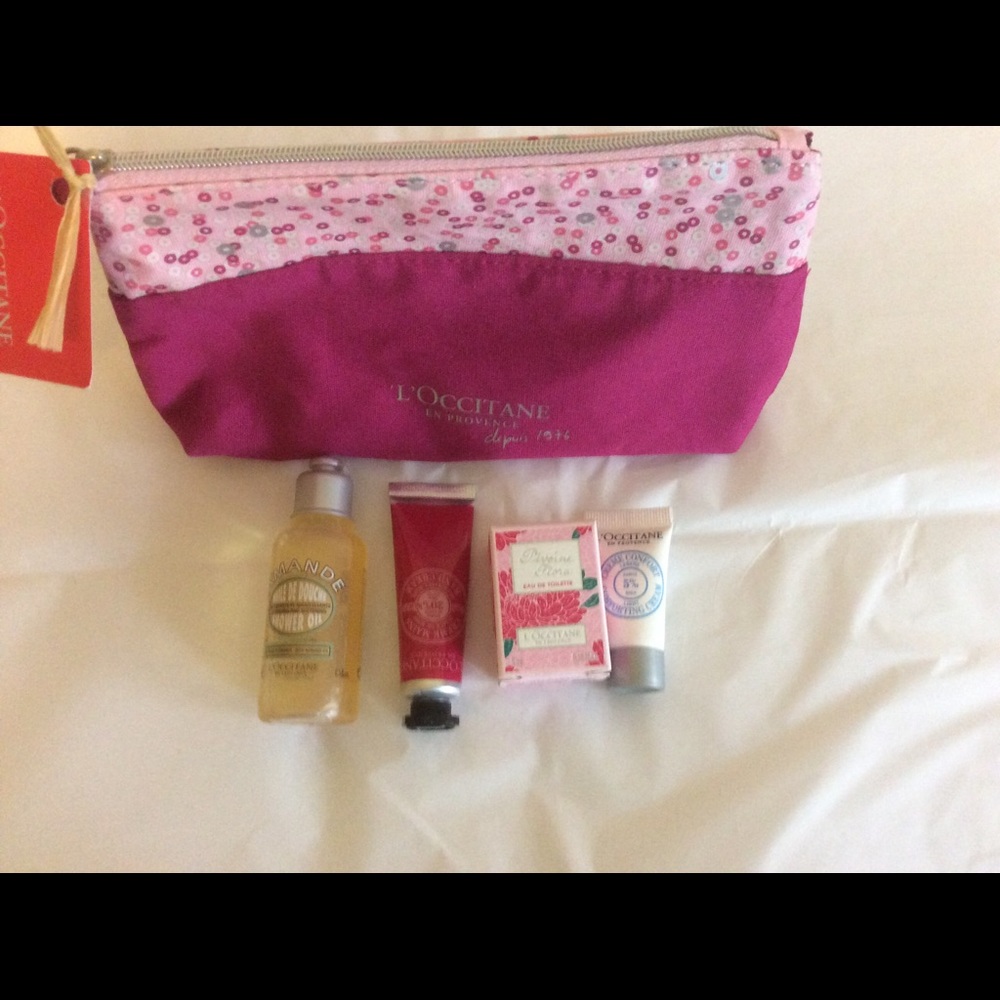 L'OCCITANE EN PROVENCE.Pink bag w/travel products