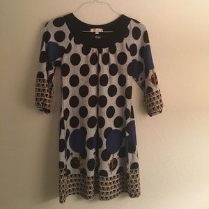 Winter dress with dots and tree pattern