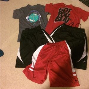 NIKE THREE PAIR SHORTS AND TWO SHIRTS