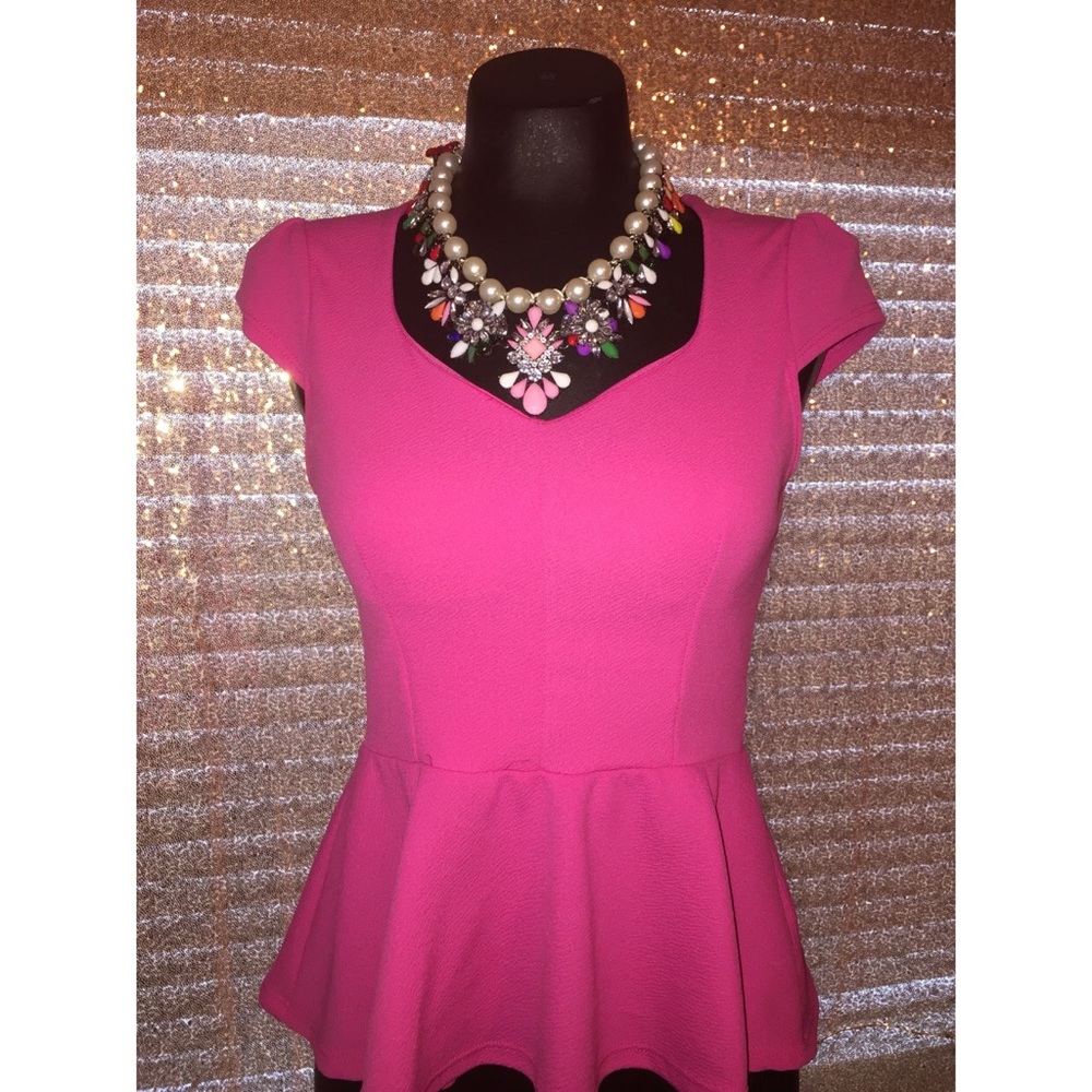 Very girly hot pink peplum top!