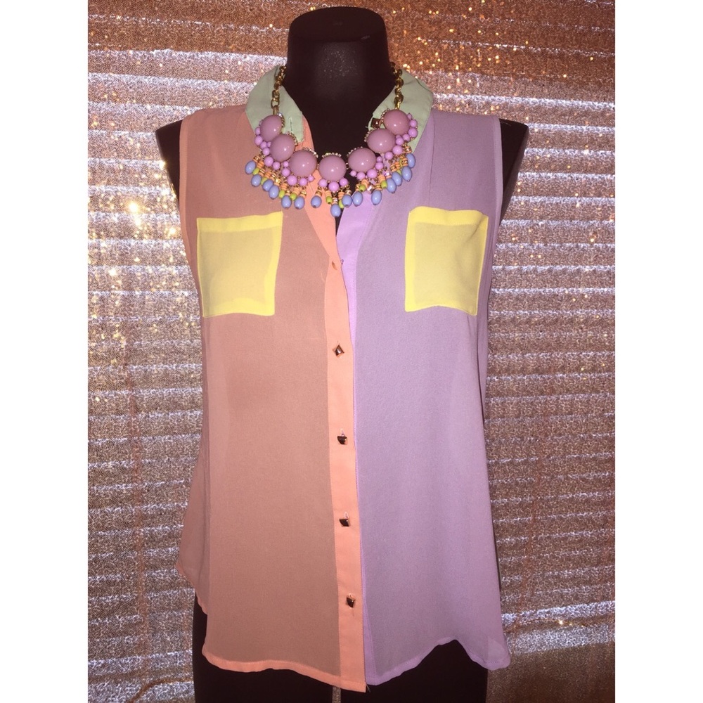 Fun , flirty pastel colored color block top!