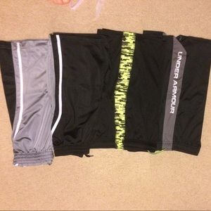One pair- under armour shorts and three tech gear