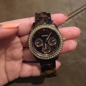Brown and gold tortoise Fossil watch.