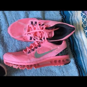 Bright pink Nike Air Maxes.
