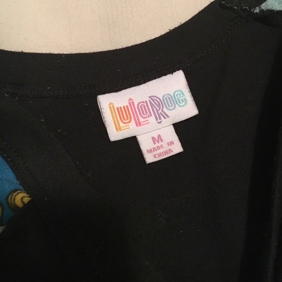 LuLaRoe Tops - LLR "Randy" with Unicorn sleeves LuLaRoe Tops - LLR "Randy" with Unicorn sleeves