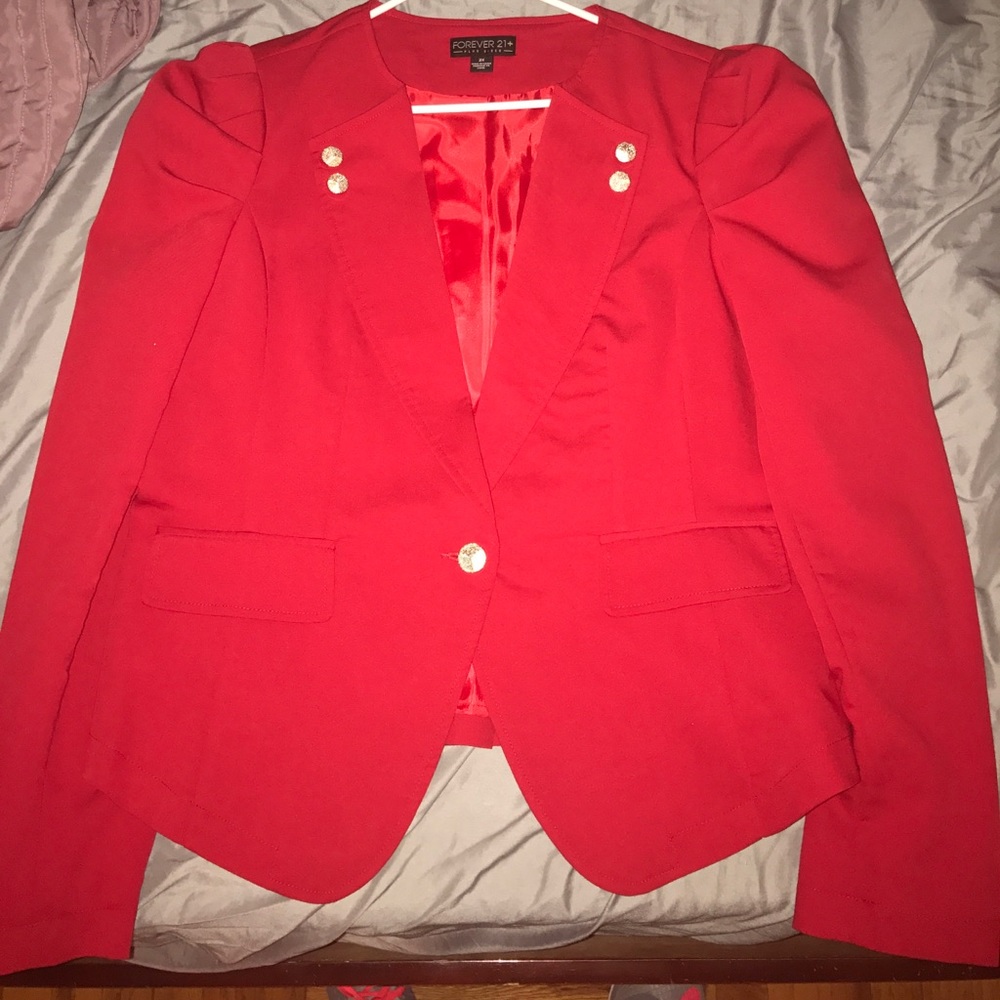Beautiful, red blazer in almost new condition.