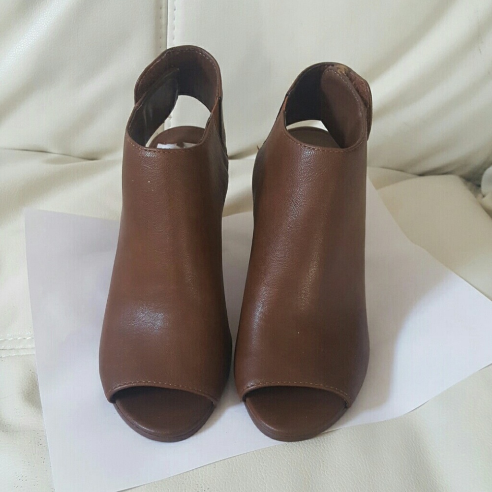Synthetic leather, open toe booties.