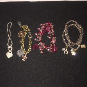 Four charm bracelets