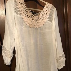 Creamy white flowy blouse with crochet accented