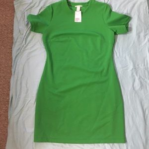 Fitted green mod style dress
