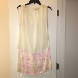 Sequin sheer club dress.