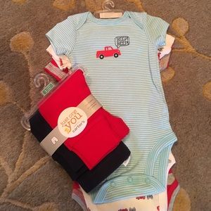 Brand new Carter's short sleeve onsies and pants