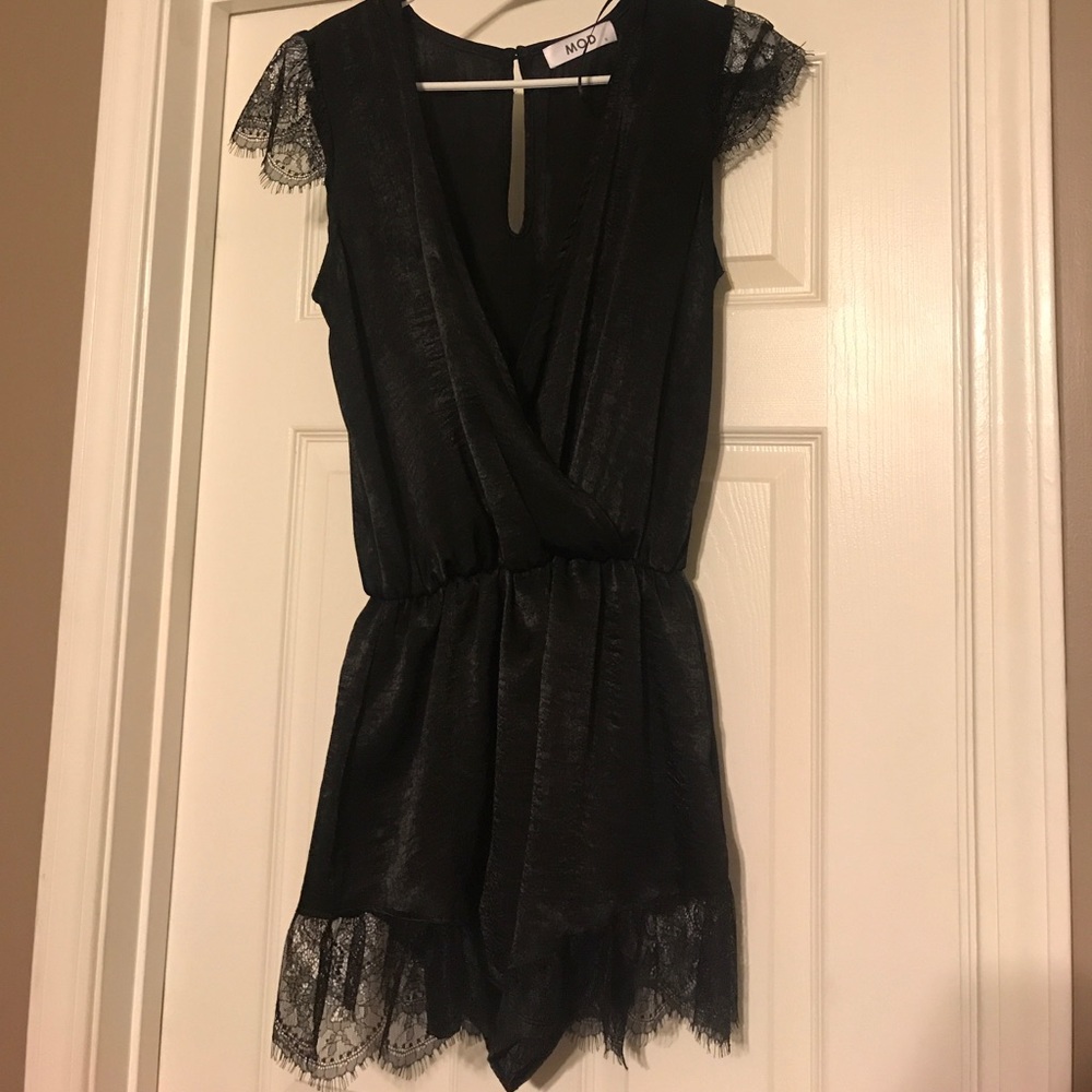 Boutique black romper. Size Small.