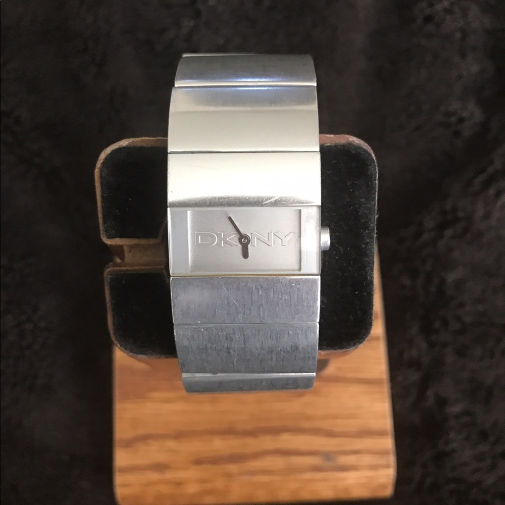 DKNY silver cuff watch.