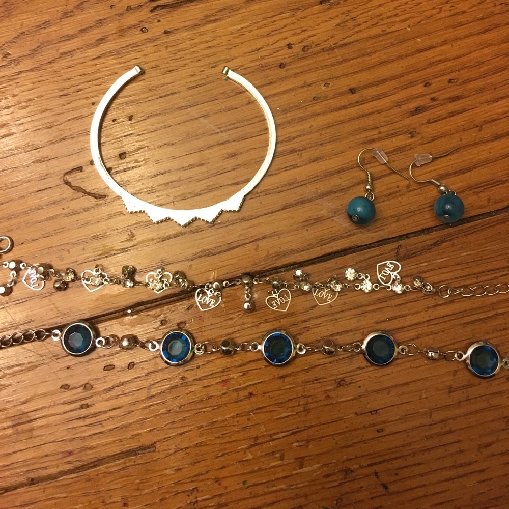 3 bracelets and set of earrings.