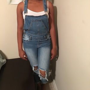 Fashion Nova So Over You Ripped Leg Jean Overalls