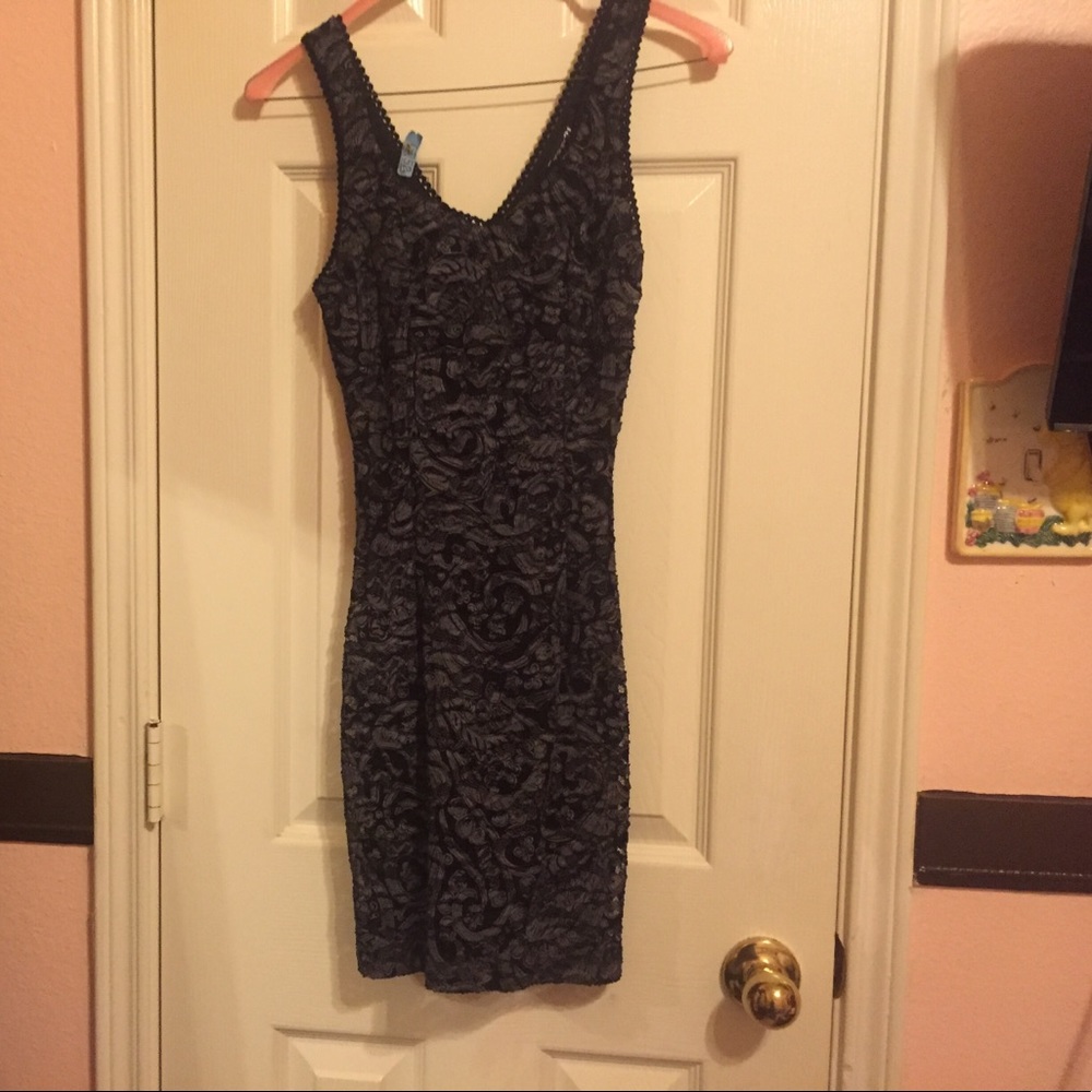 Tight short gray laced black dress