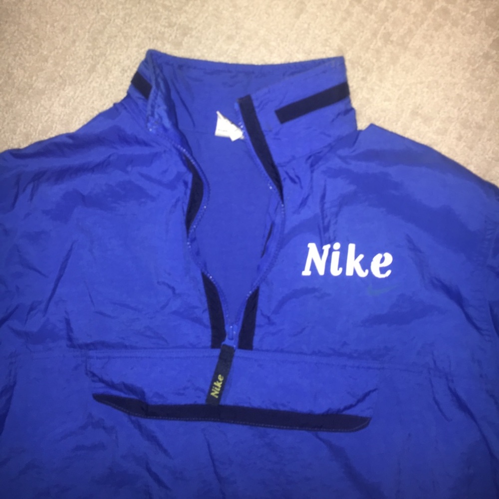 NIKE WINDBREAKER size large blue with black