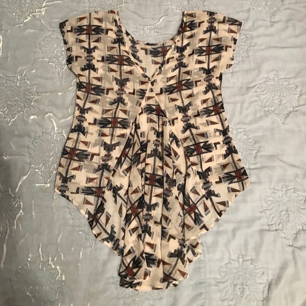 Chiffon Top with Fun Back Detail!