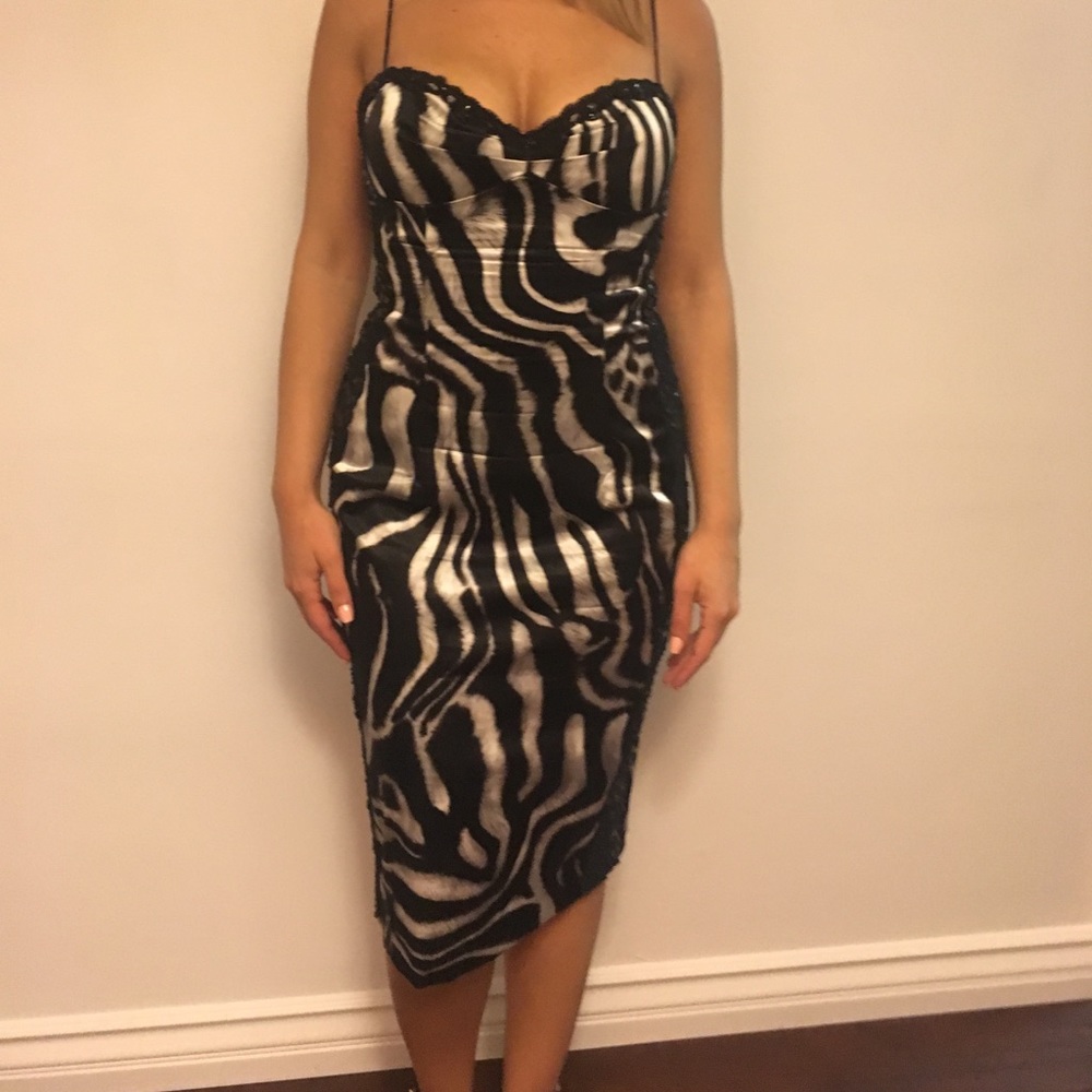 Print dress with lace and sequin detail.