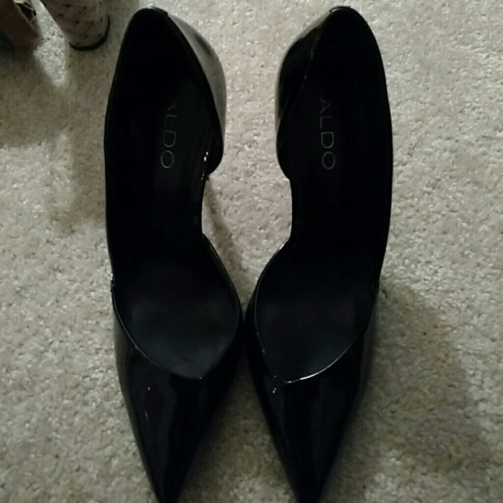 Aldo black patent pumps