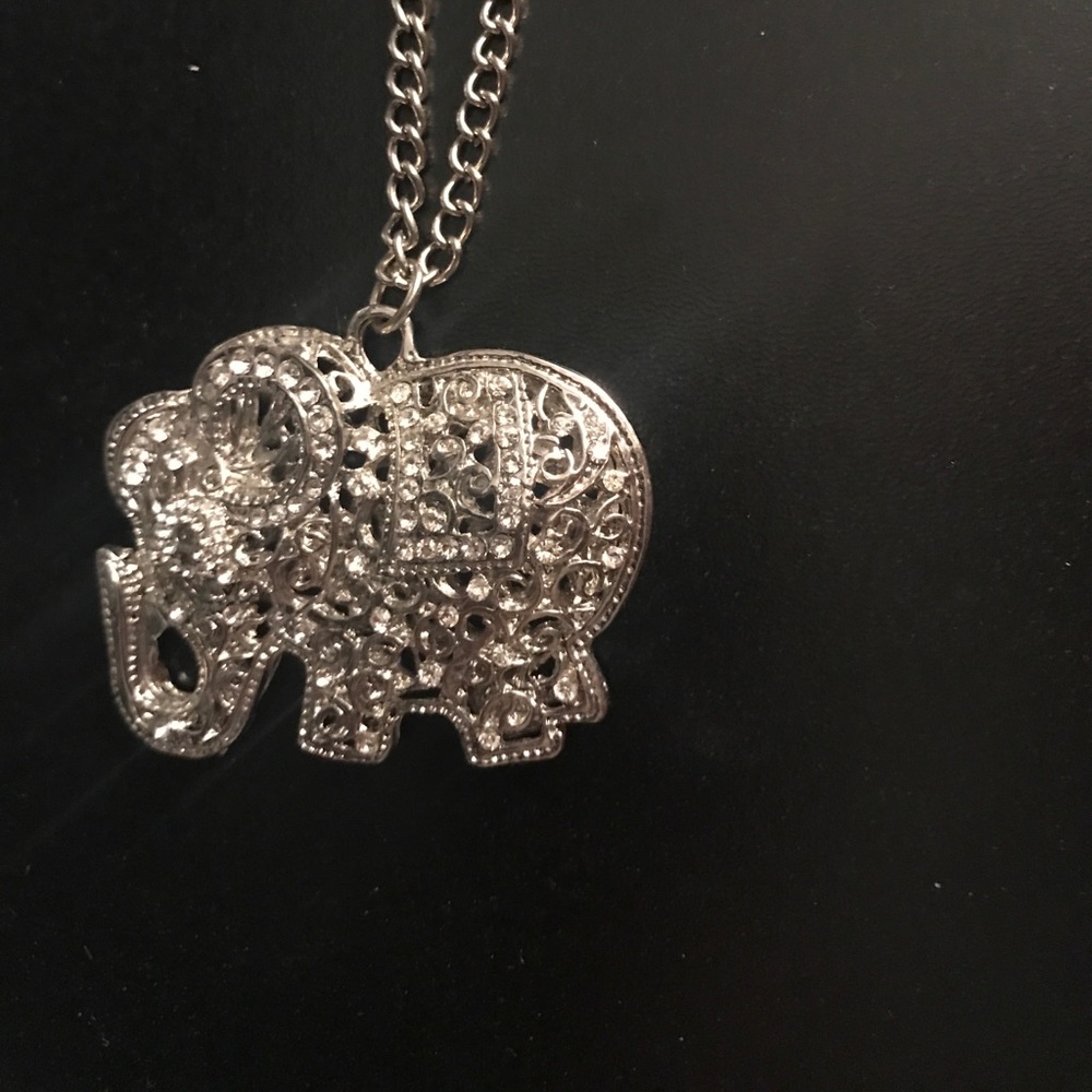 Long silver elephant pendant necklace