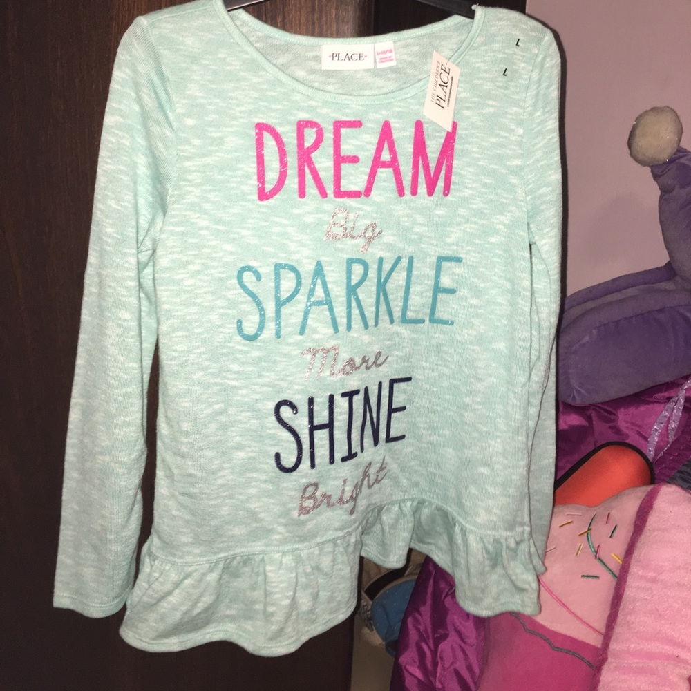 Blue shirt with quote on it