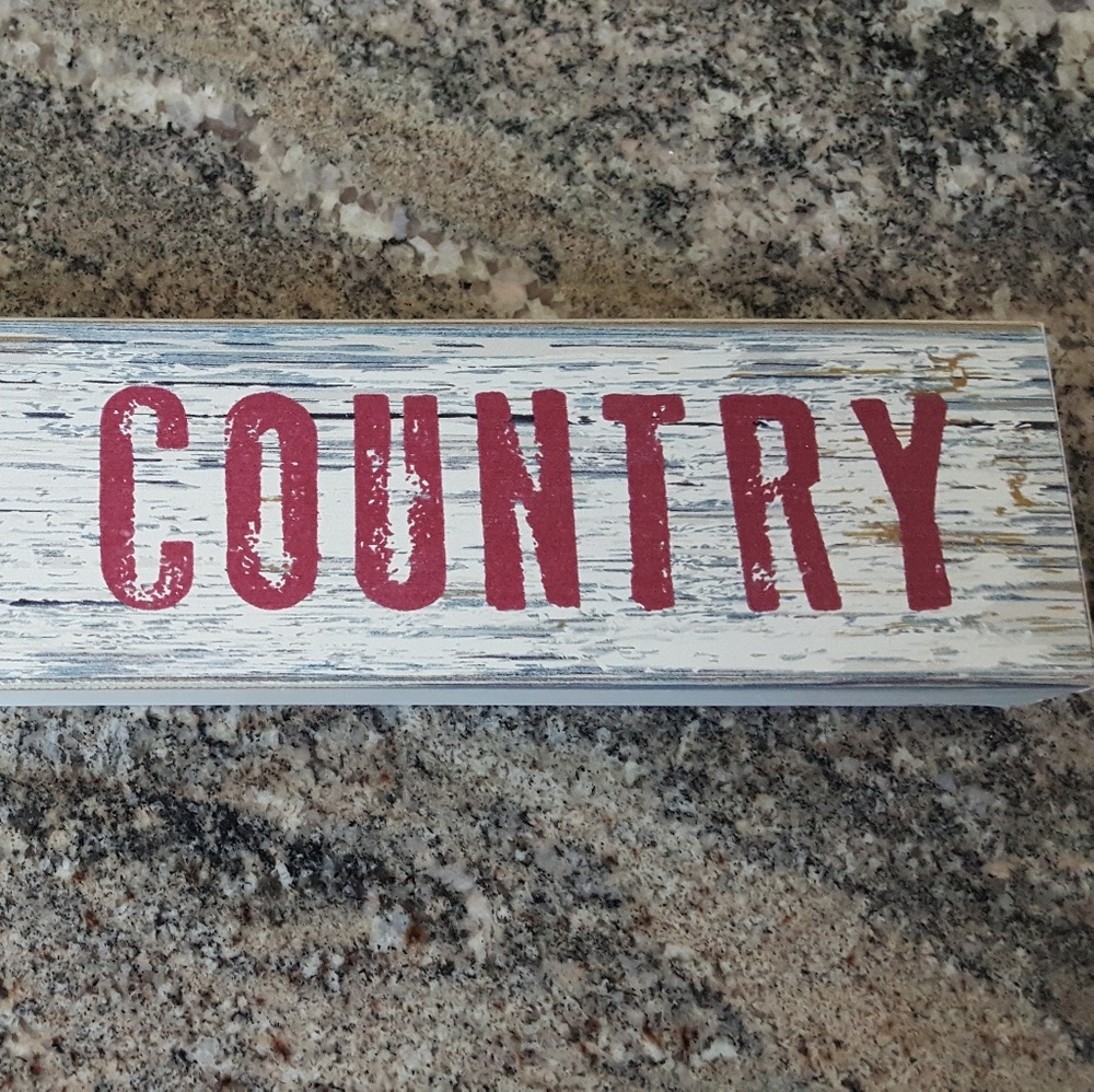 "GONE COUNTRY" sign