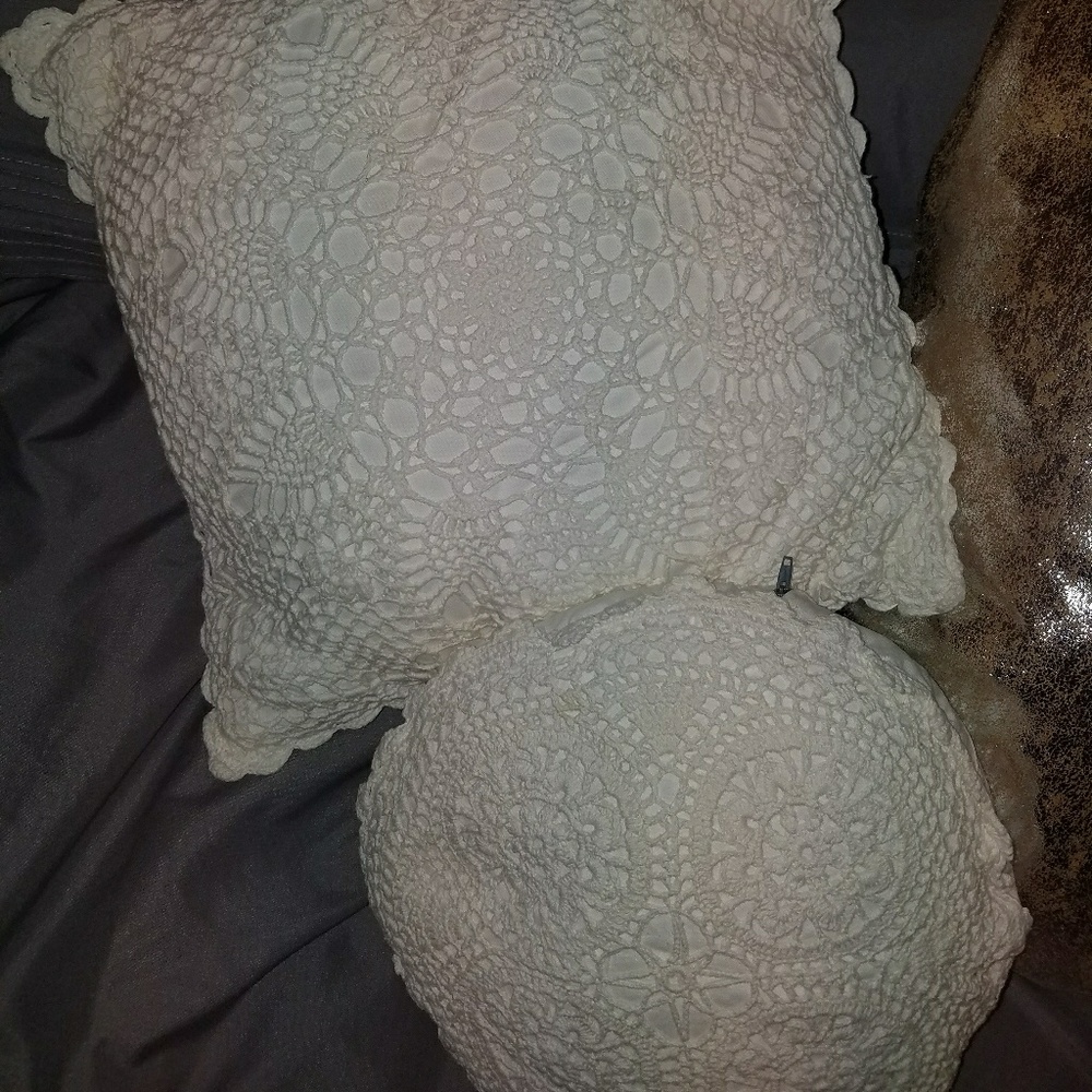 2 White throw pillows