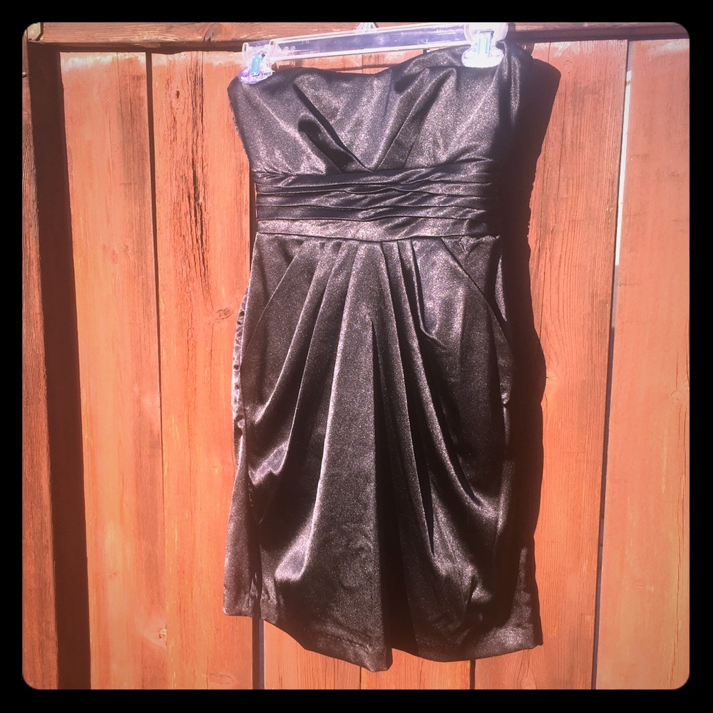 Strapless black dress with bow detail on back