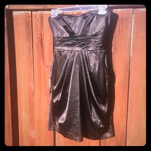 Strapless black dress with bow detail on back