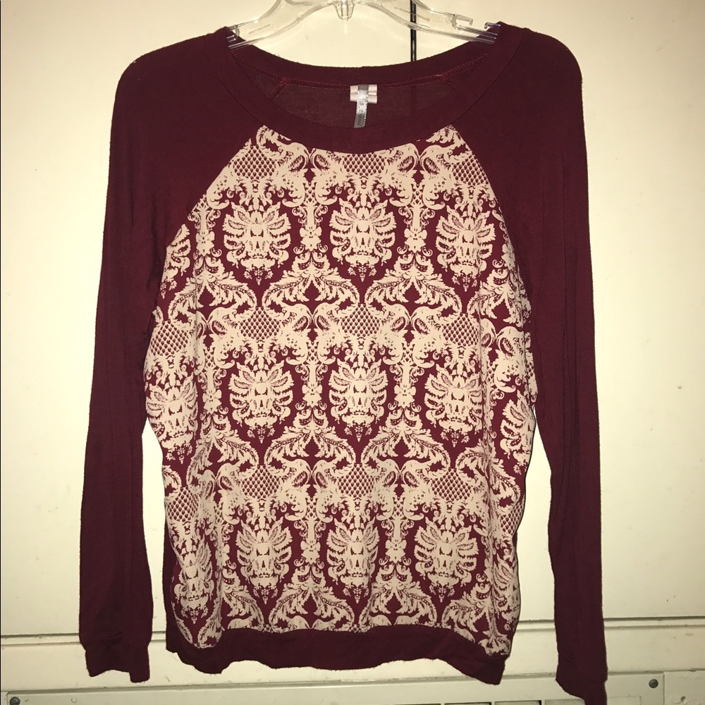 Red and cream long sleeve shirt