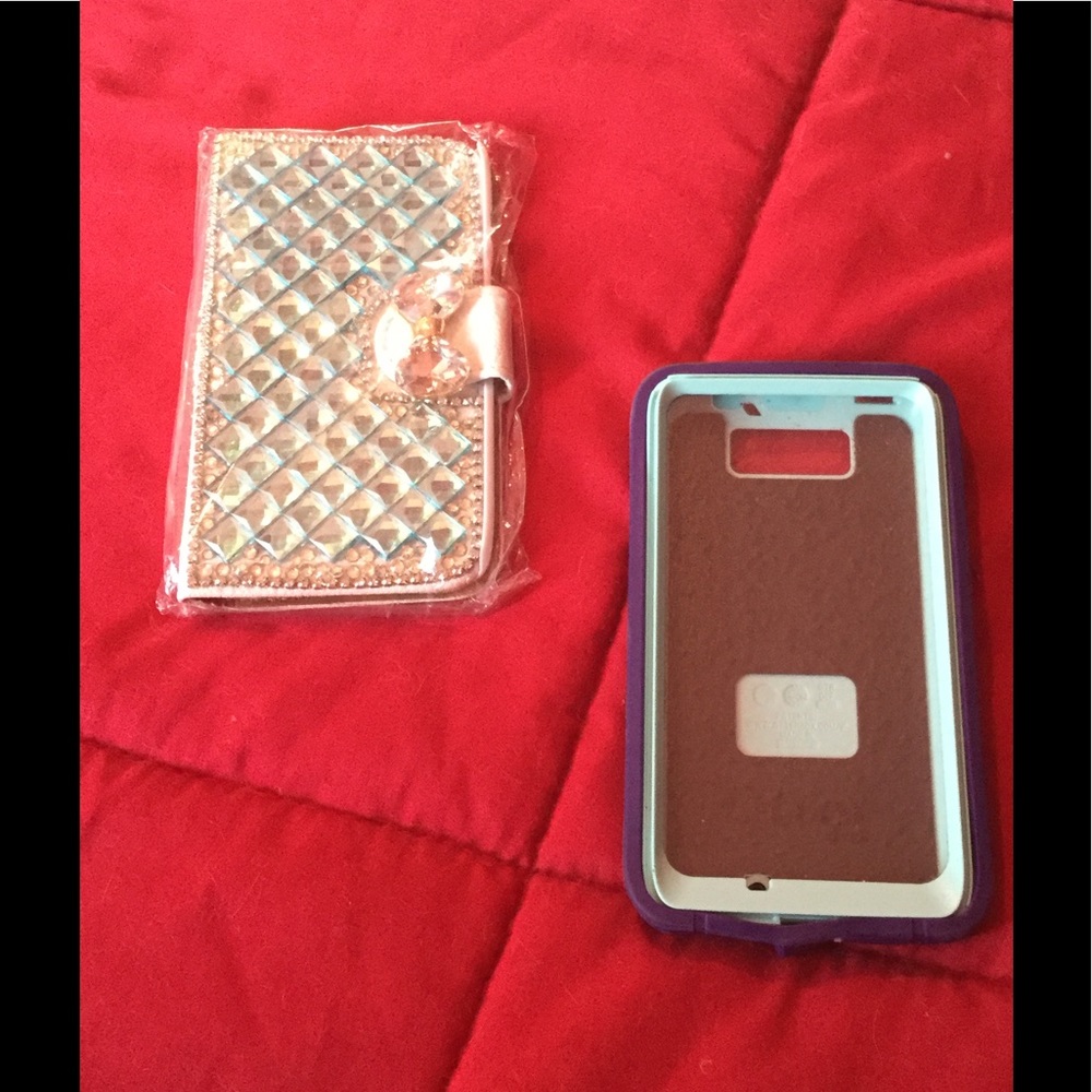 TWO ANDROID MAXX CELL CASES . . .