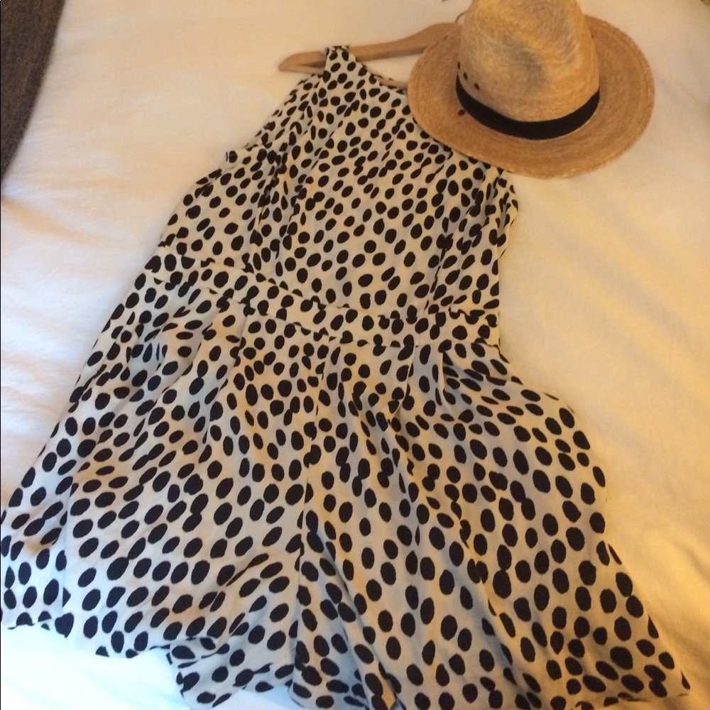 Beige romper with black polka dots