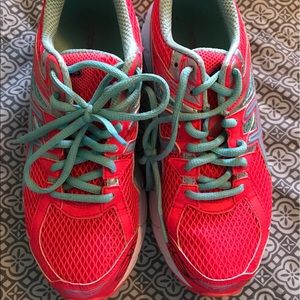 Pink Asics running shoes