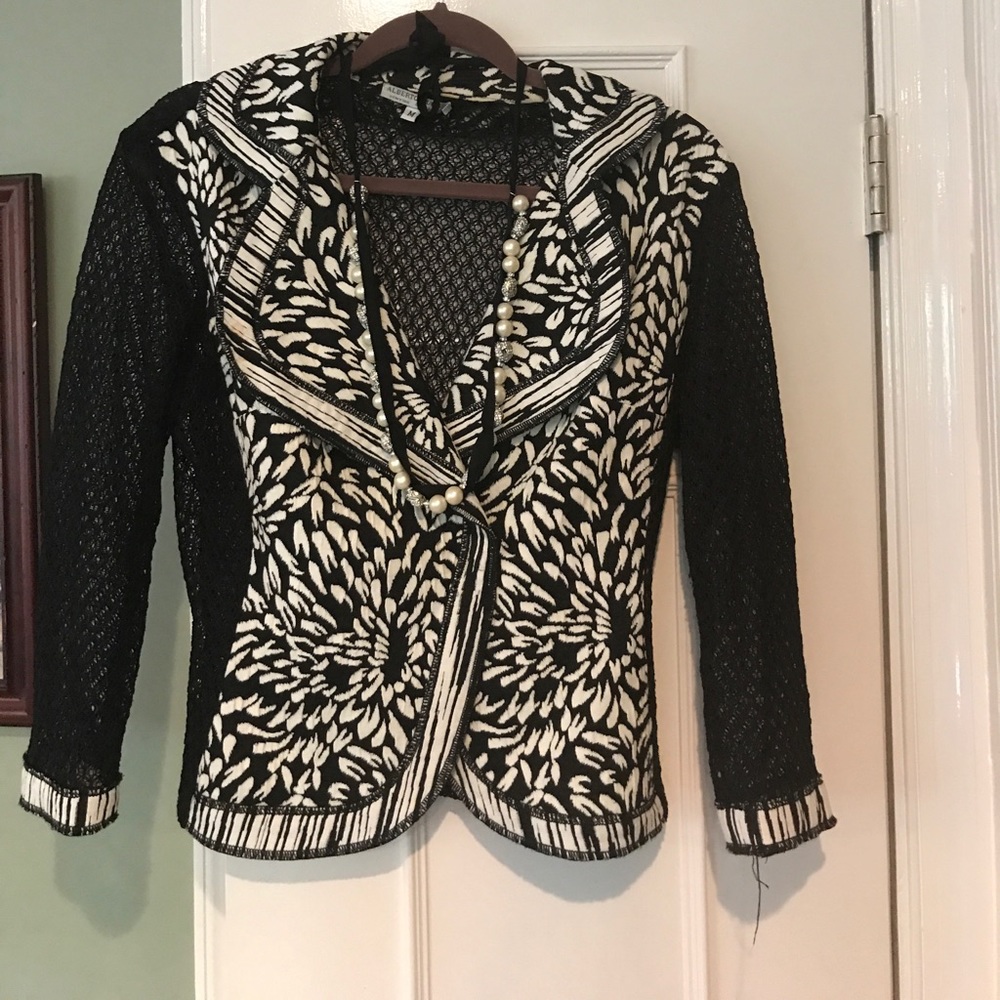 Black and White fitted blazer.