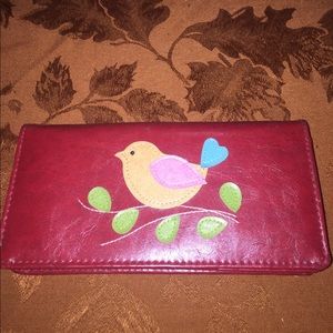 A Lavishy red wallet with sweet bird design.