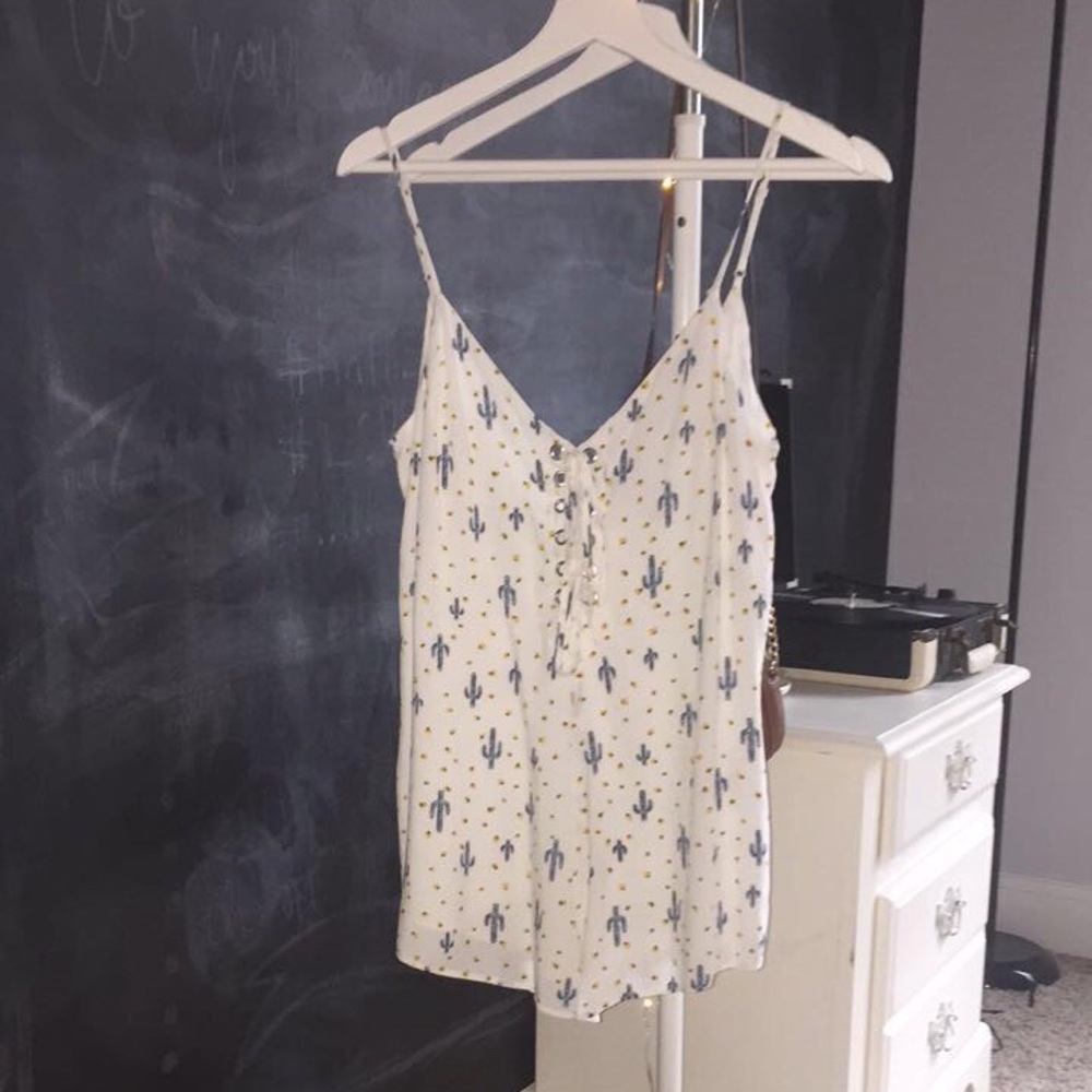 WHITE ROMPER WITH TEAL CACTUS AND YELLOW DOTS