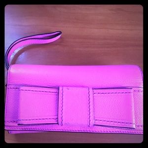 Kate spade wrist wallet, fucsia color