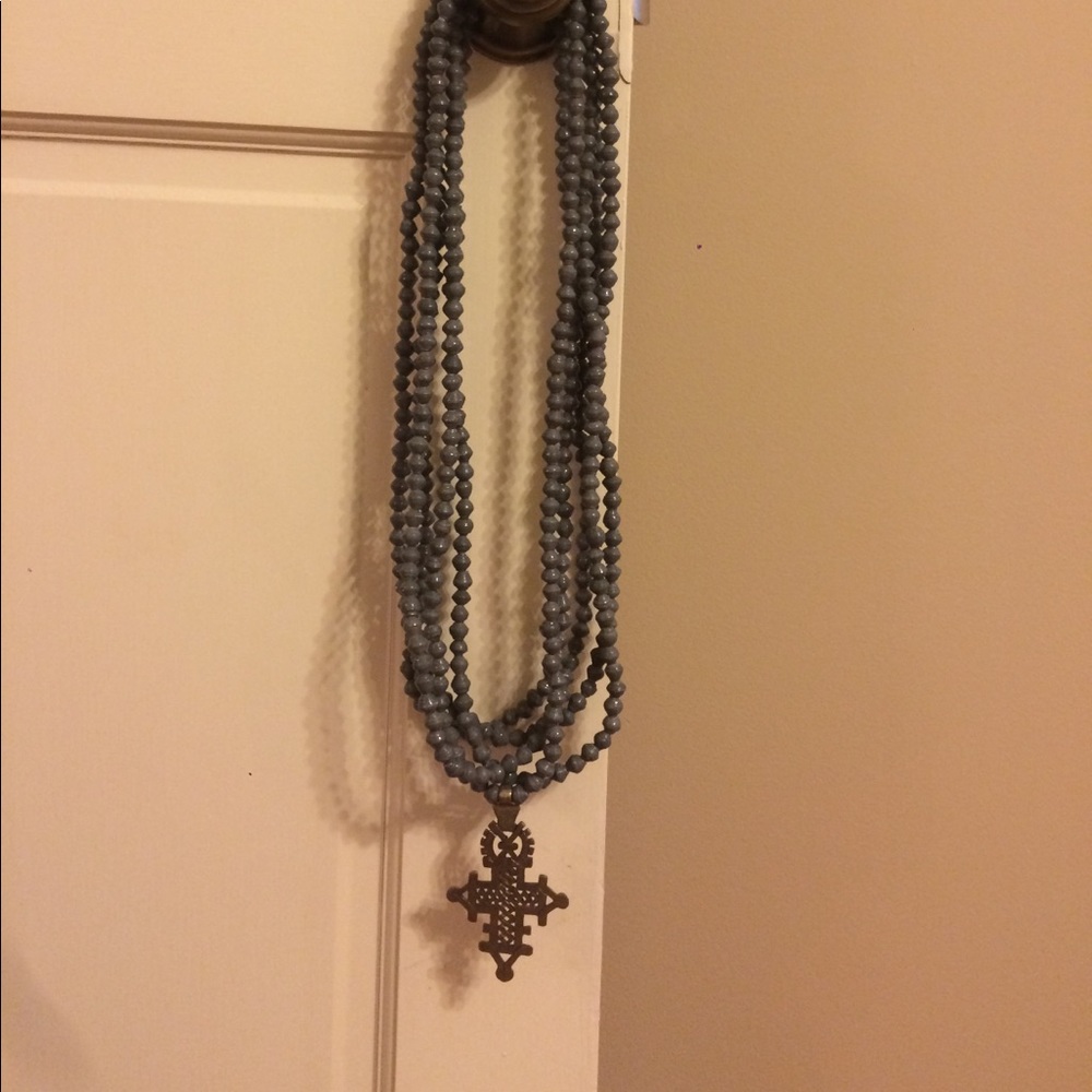 Hand made gray beaded necklace with cross