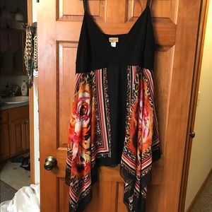 Gorgeous tank with long shark bite sides.