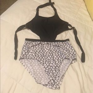 One-piece black and mermaid scale swimsuit