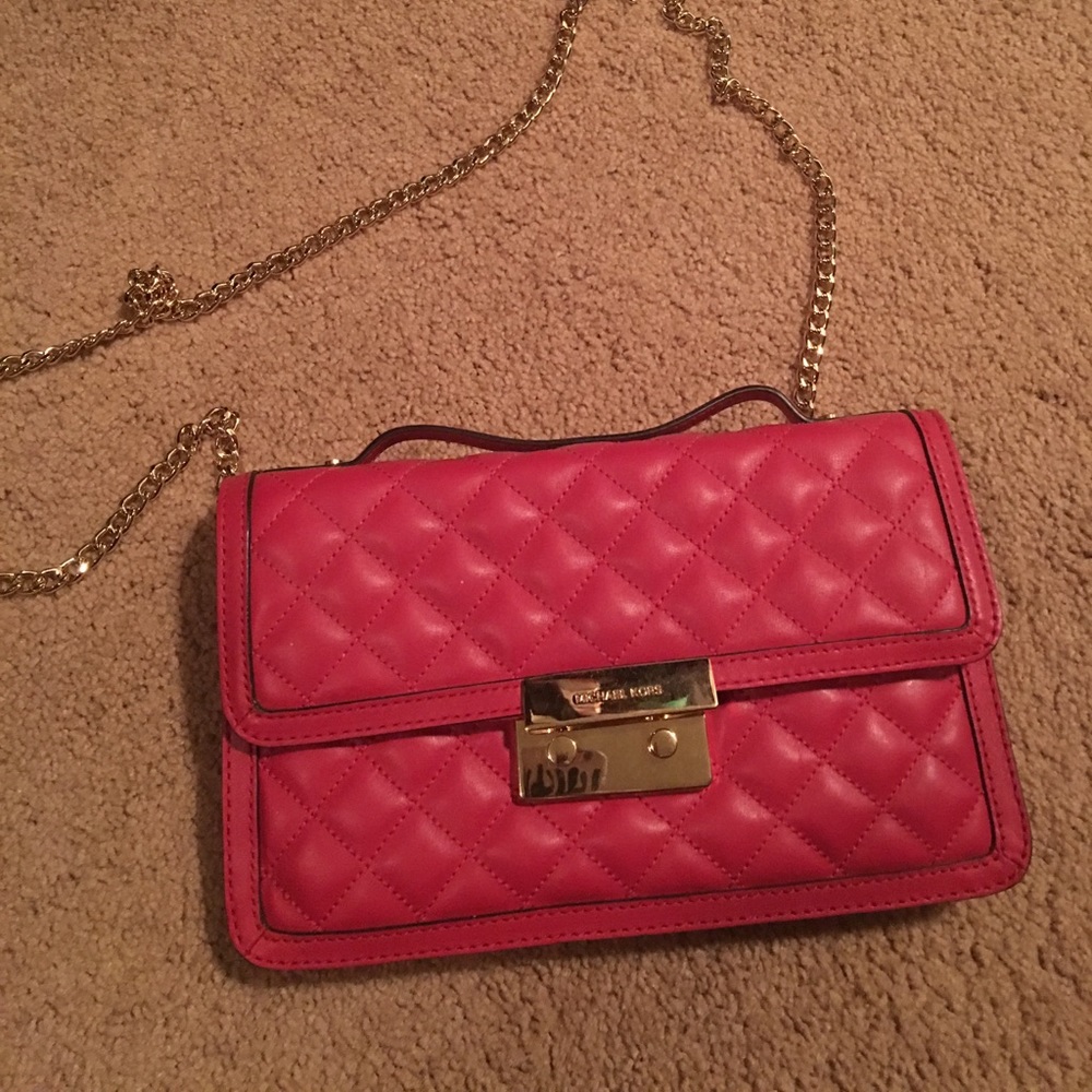 Red Michael kors clutch.❤️