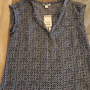 Blue and white sleeveless blouse