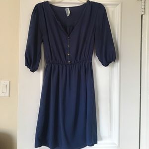 Navy blue dress with brass buttons