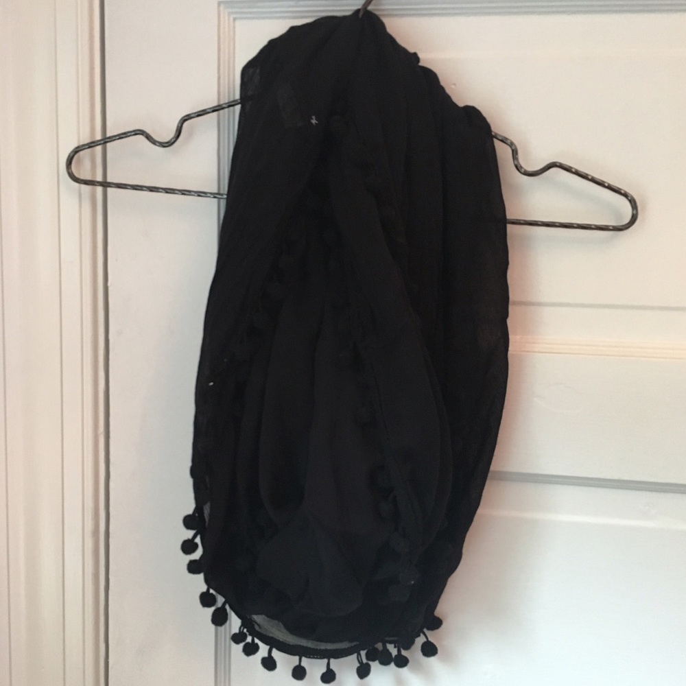 Black infinity scarf with pom pom trim