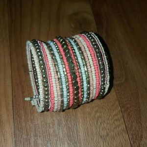 Coral, gold and white cuff bracelet