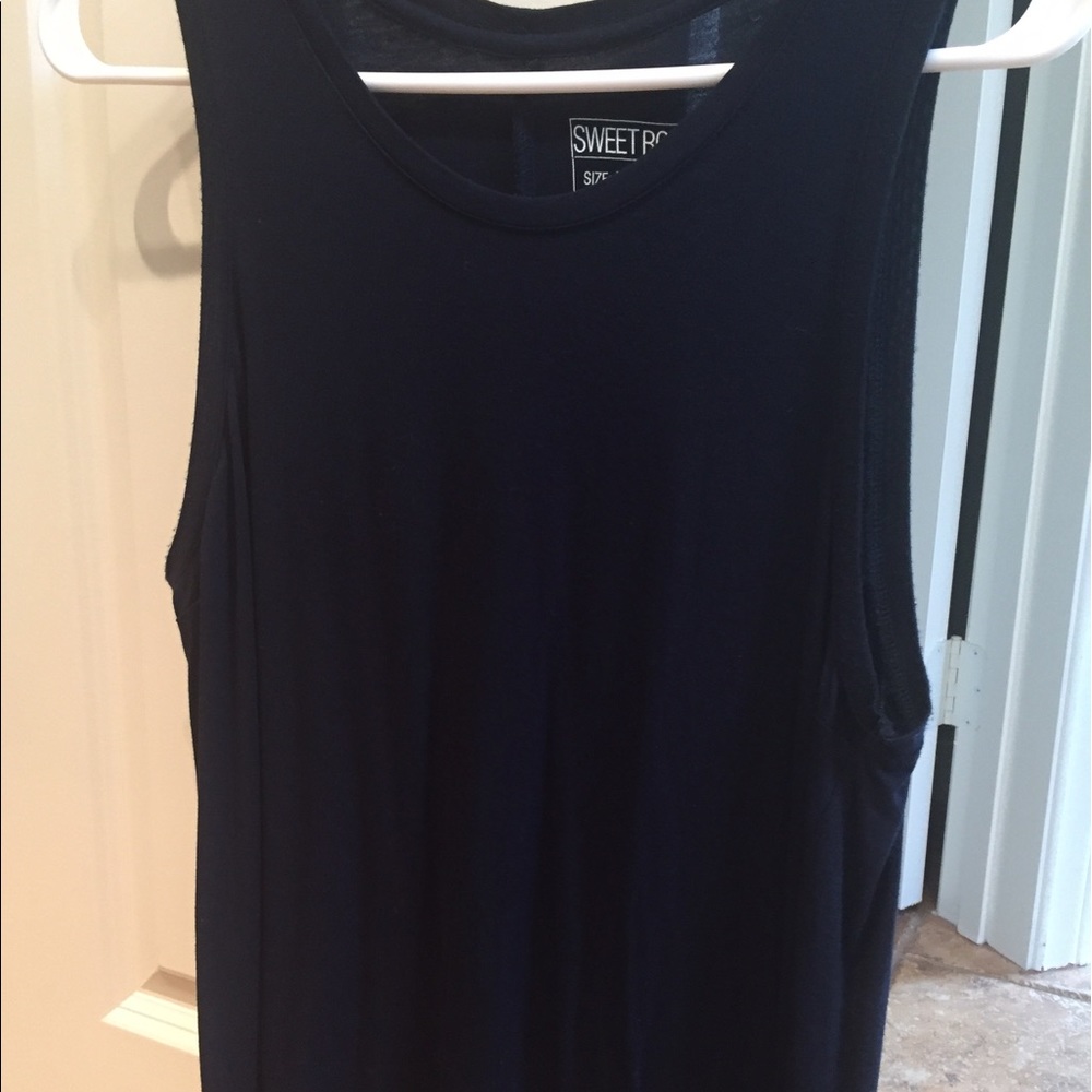 Navy blue tank top with 3inch slit in back.